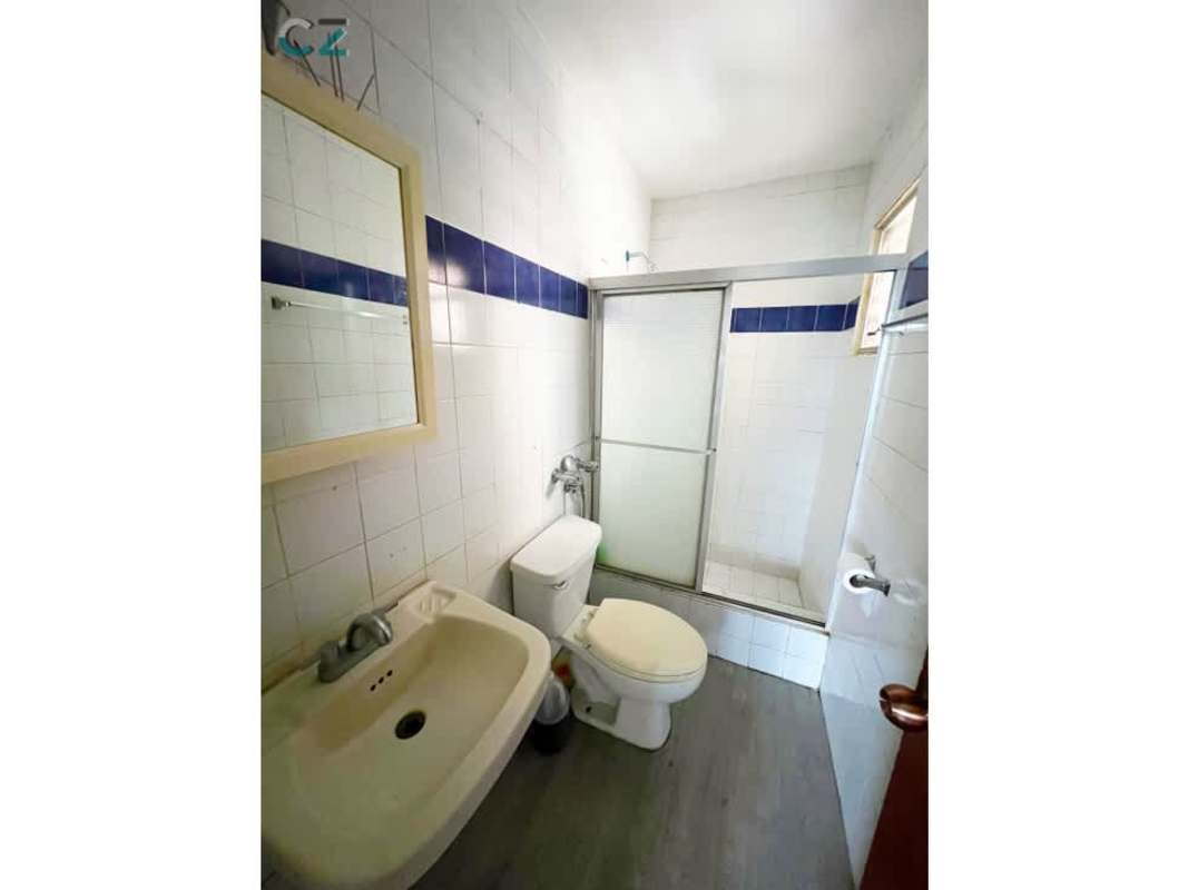 Simple kitchen with double sink, blue ceramic tiles PH Coco del Mar Tower Panama