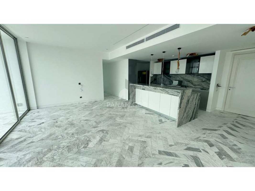 Luxury marble kitchen with island open to large living area at Wanders Yoo Marbella Panama