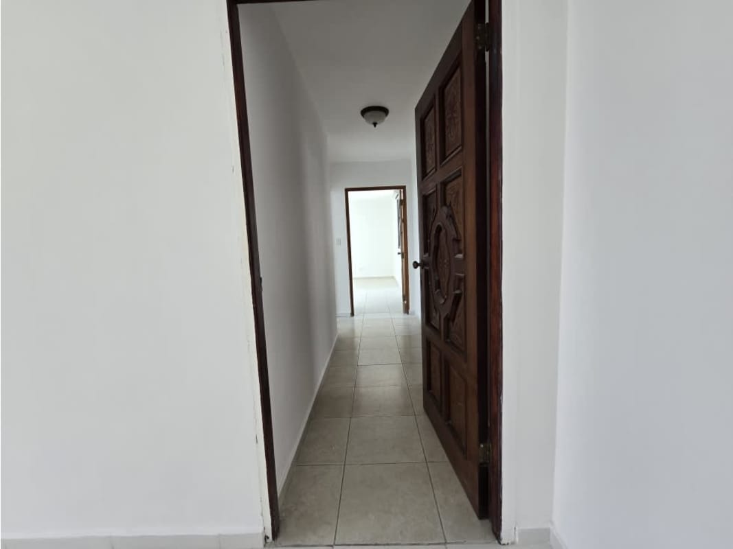 Kitchen with wooden cabinets, granite countertops, tile backsplash PH Lexus Tower San Francisco Panama