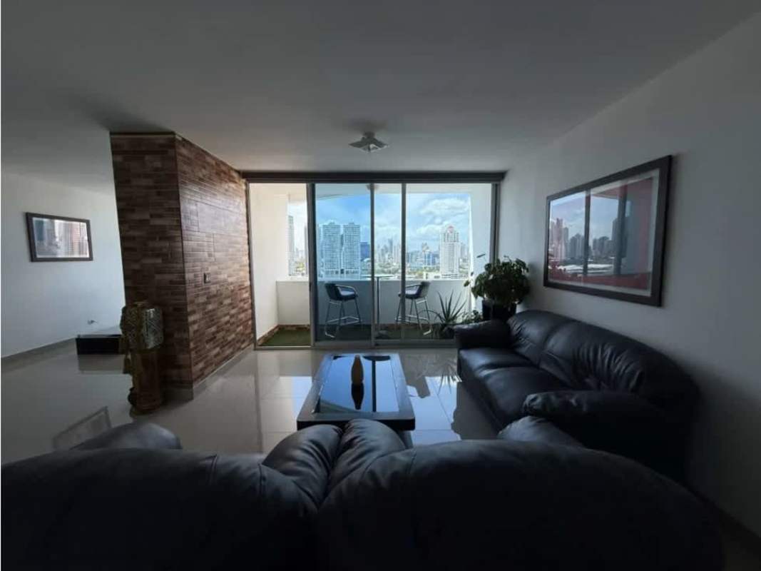 Furnished master bedroom with large window and city skyline views PH Infinity San Francisco Panama