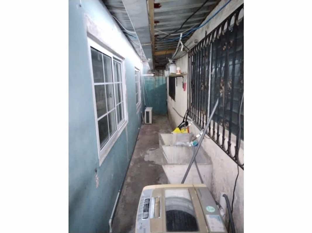 Narrow outdoor corridor with partial covering in Altos de Las Acacias Juan Díaz Panama