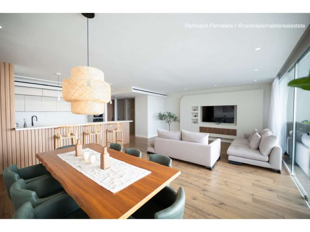 Furnished bedroom with large window and cityscape view PH Oceanaire Punta Pacifica Panama