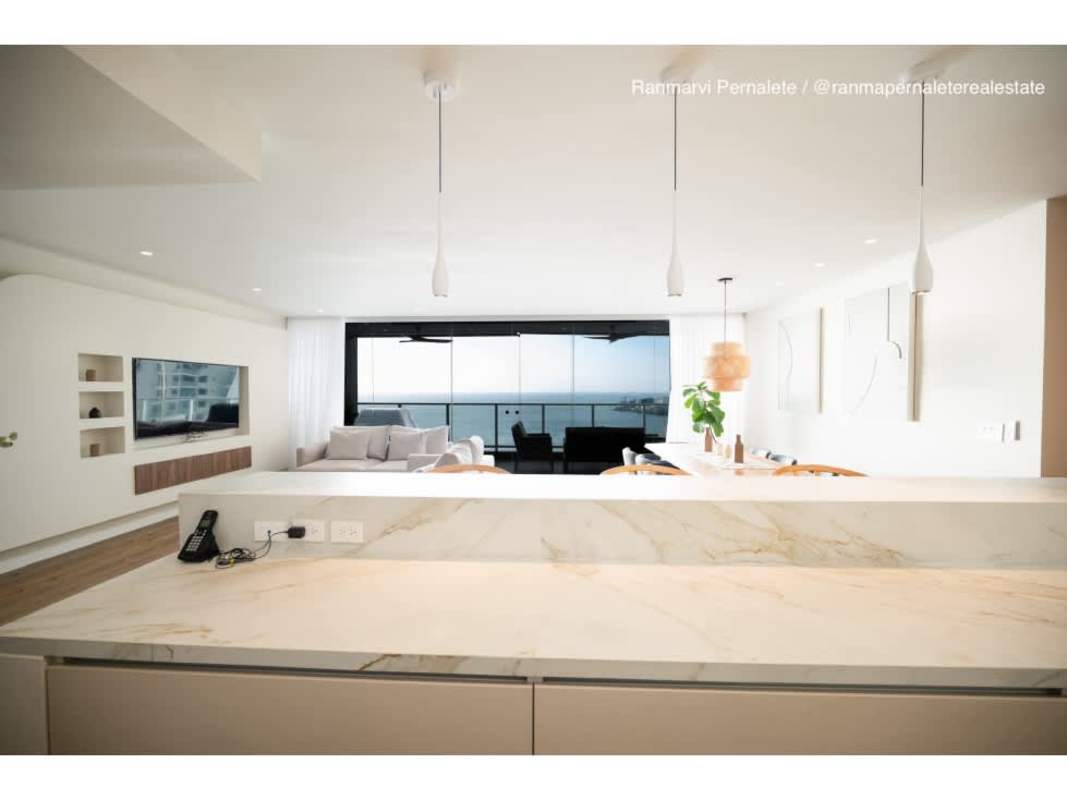 Contemporary kitchen with marble countertops built-in appliances and ocean view in PH Oceanaire Punta Pacifica Panama