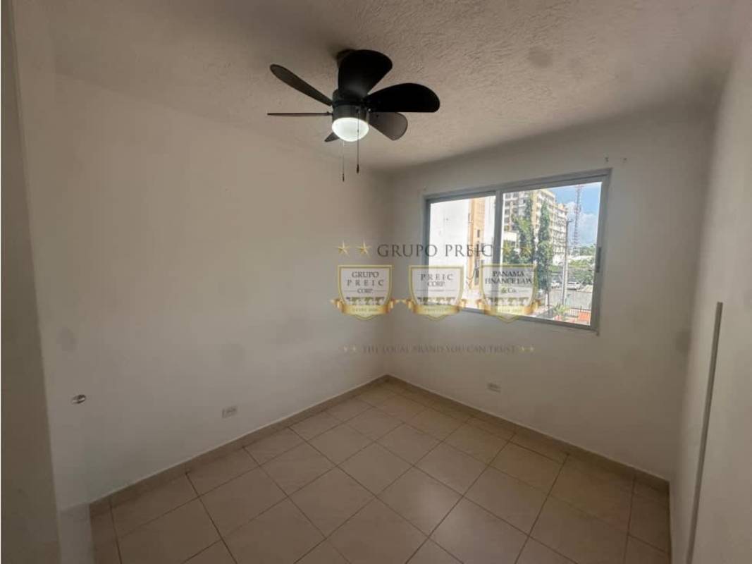 Empty bedroom with large window, ceiling fan, tiled floor, PH Parque Lindo Carrasquilla Panama