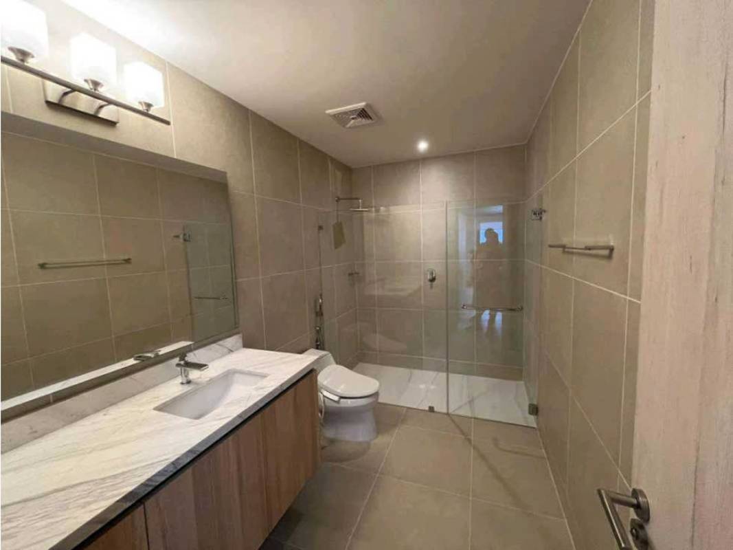 Contemporary bathroom with glass shower and marble vanity in PH Promenade Santa Maria