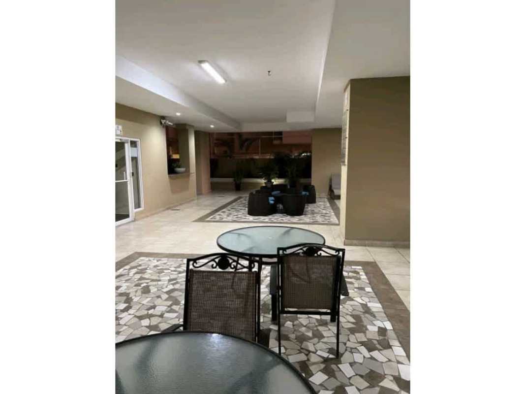 Bedroom with wooden built-in wardrobe, window with skyline view, air conditioning PH Diana Tower Obarrio