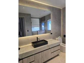 Contemporary bathroom with floating vanity and backlit mirror PH Q Tower