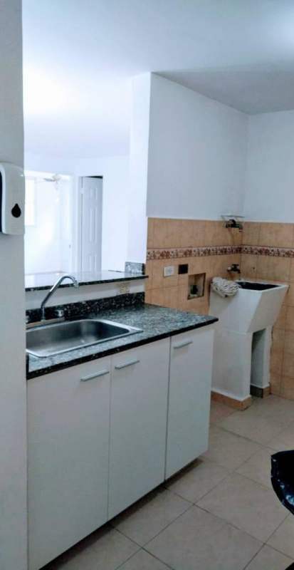 Full bathroom with pedestal sink and sliding glass shower door PH Río de Oro Rio Abajo Panama
