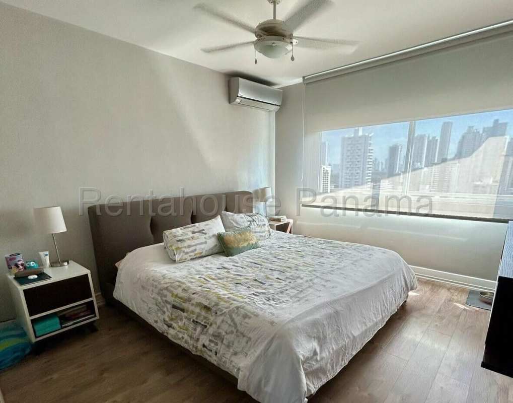 Spacious master bedroom in PH 7400 with wood floors and skyline views, San Francisco