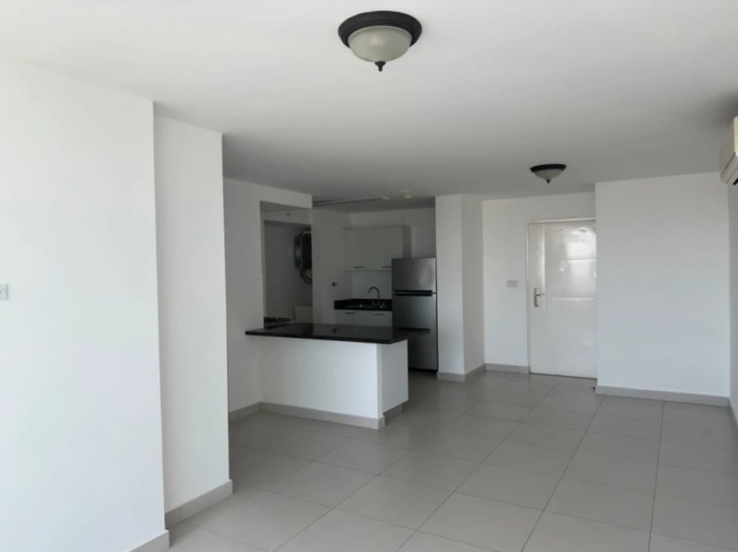 Open concept kitchen with granite counters at PH Tee One Via Porras Panama City
