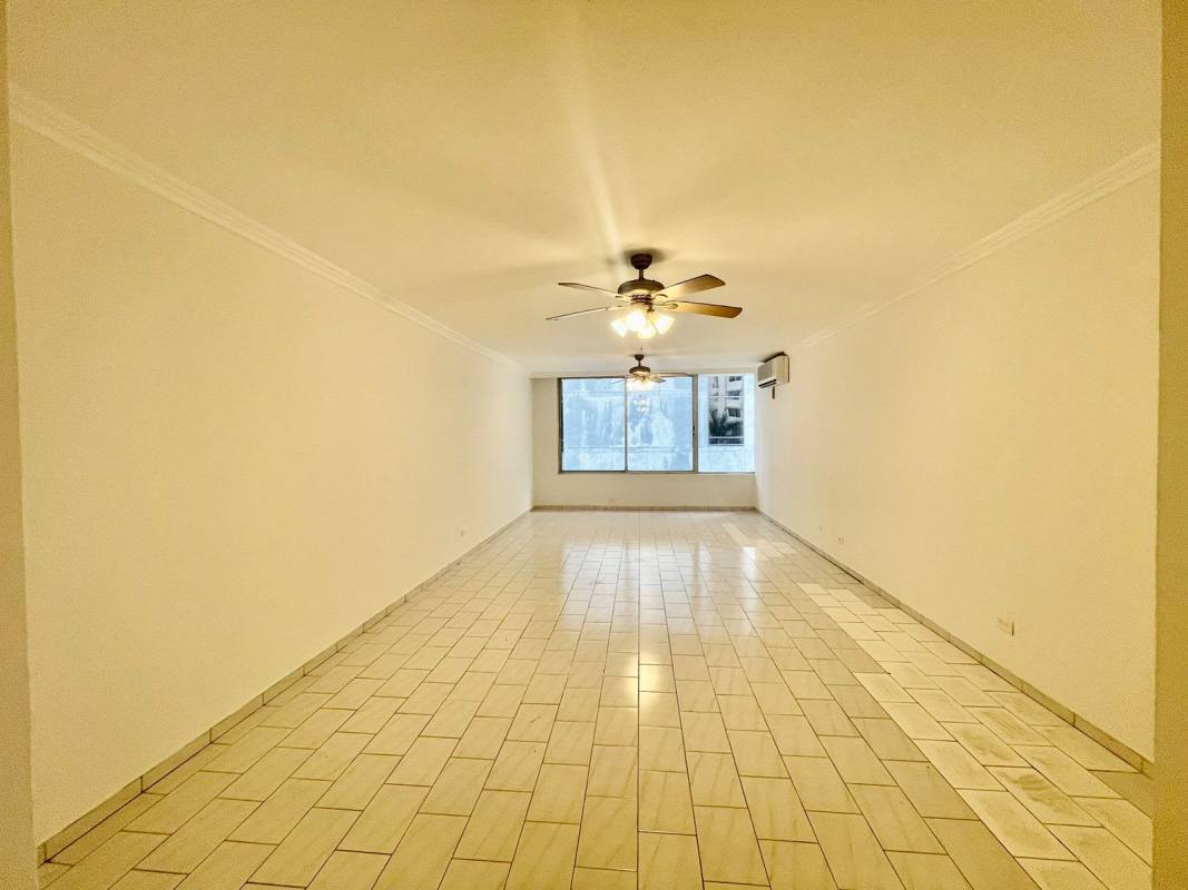 White kitchen cabinets granite countertops double sink window PH Ocean View San Francisco Panama City