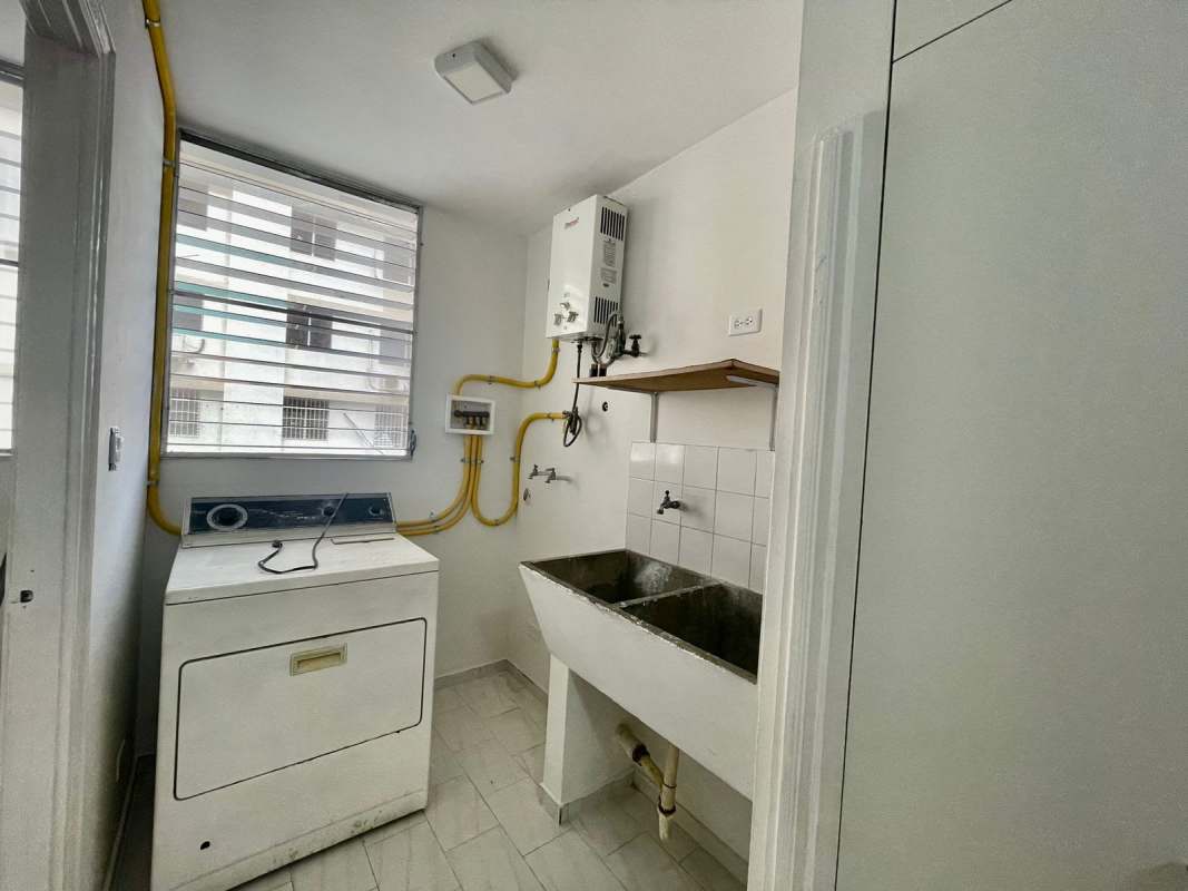 Laundry area with sink water heater window PH Ocean View San Francisco Panama