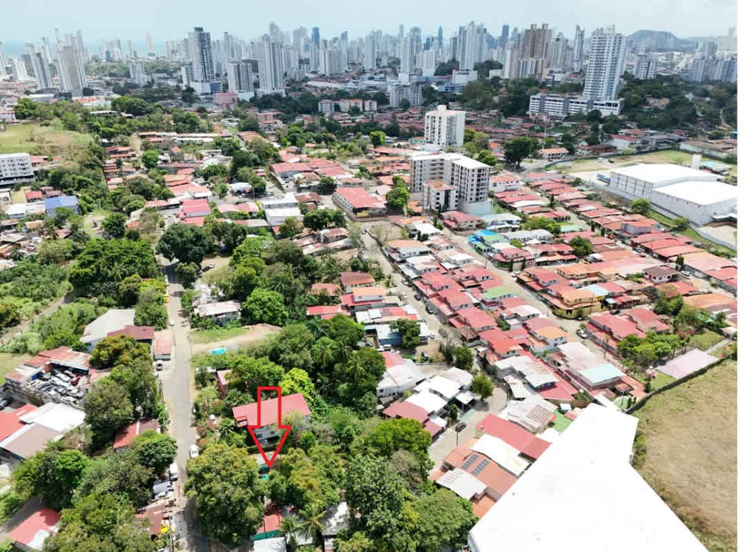 Aerial view showing rectangular plot highlighted in red surrounded by urban infrastructure in Pueblo Nuevo Panama