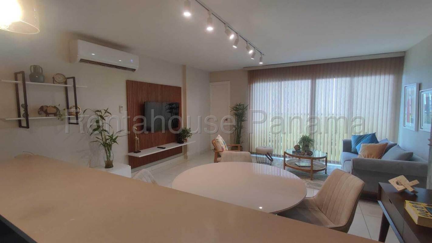 Modern furnished living room with balcony door in PH Moon Tower Coco del Mar Panama