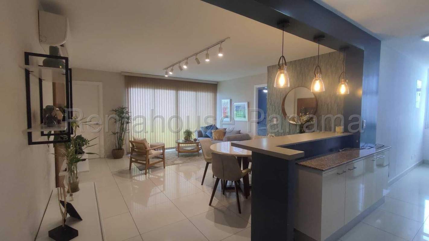 Spacious open-concept living and dining with access to balcony in PH Moon Tower Coco del Mar Panama City