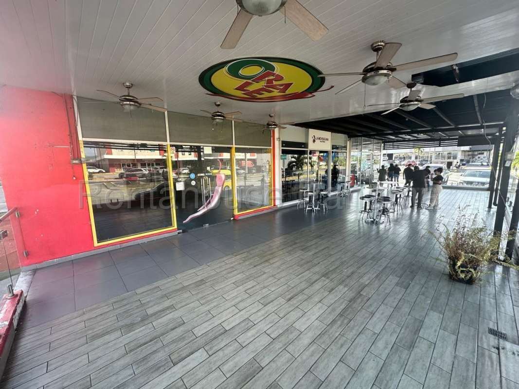 Large parking lot area in front of shopping center Brisas Mall Panama