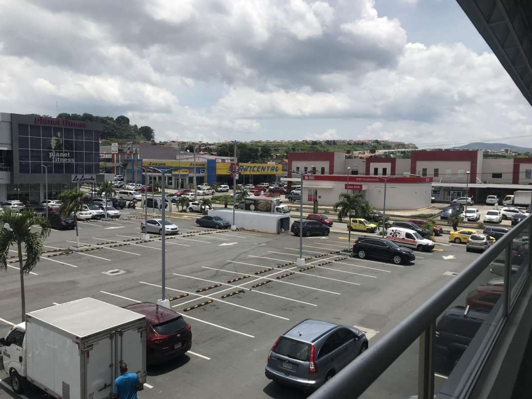Spacious open commercial unit interior with tiled flooring at Brisas Mall Panama
