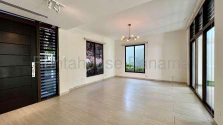 Kitchen with granite countertops and stainless steel appliances in PH Nativa Panama Pacifico