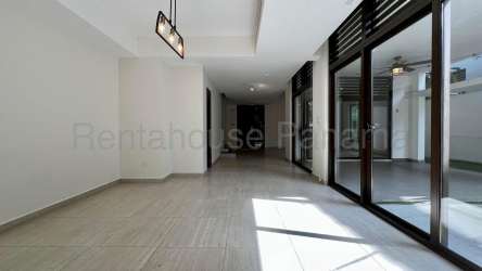 Bright master bedroom with ensuite bathroom, tile floors in PH Nativa Panama Pacifico