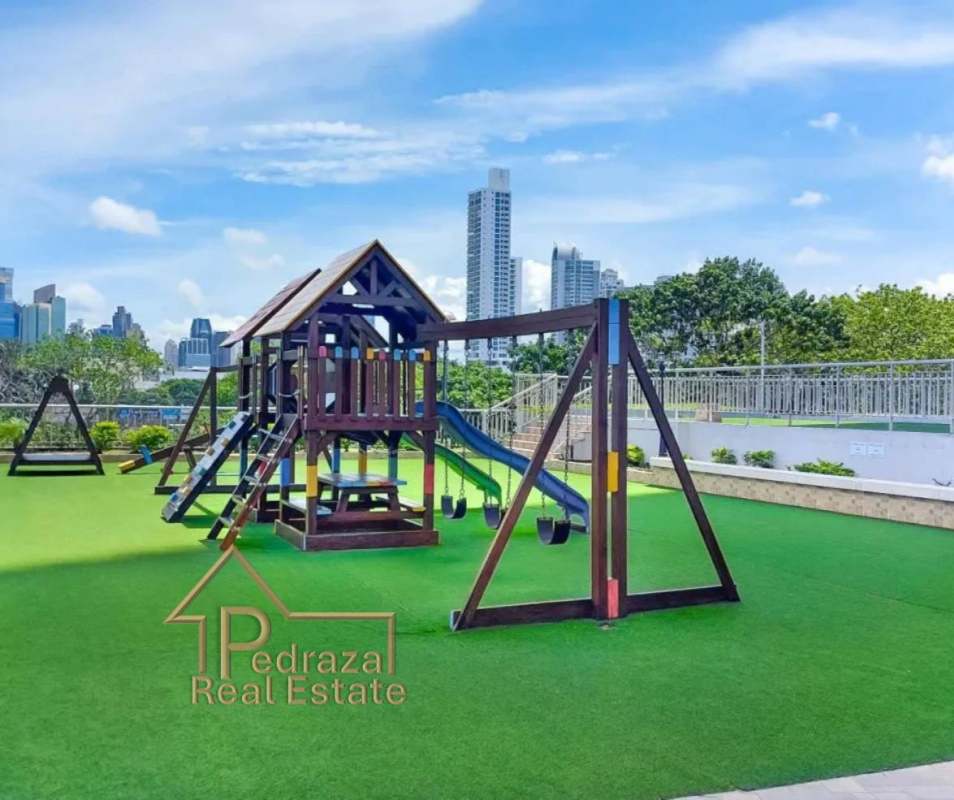 Modern kitchen with granite countertops, gas stove, white cabinetry in San Francisco Bay Panama City apartment for rent