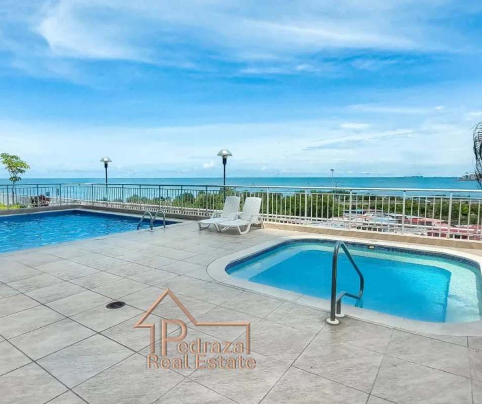 Bright living and dining area with ocean views in San Francisco Bay Panama apartment for rent