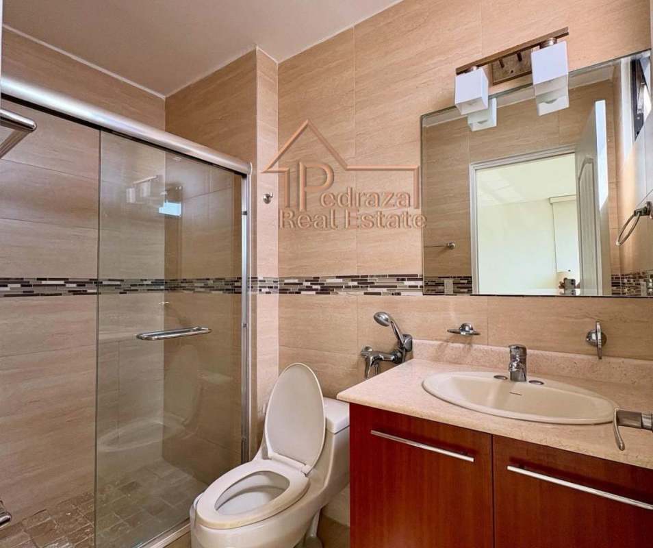 Swimming pool area overlooking the ocean and Panama City skyline at San Francisco Bay complex Panama