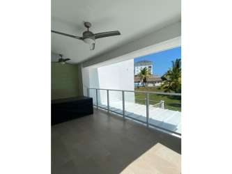 Private balcony with ceiling fans and tropical views in Bijao Beach apartment Panama