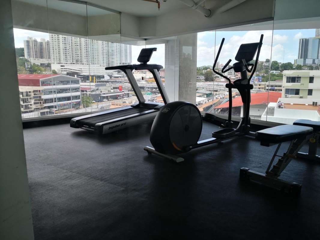 Fully equipped gym with large windows city views PH El Carmen Panama