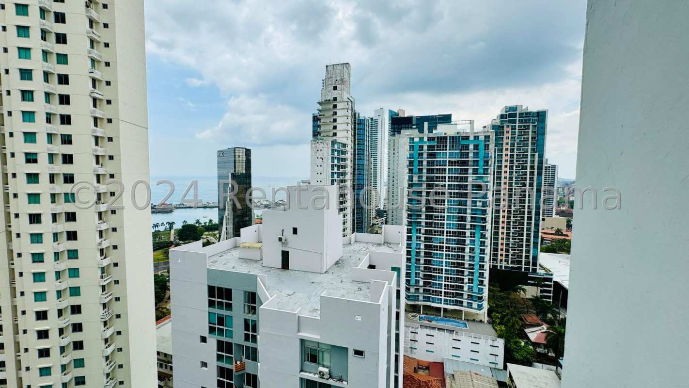 Kitchen with granite countertops wood cabinets in PH Bellavista Tower Panama City