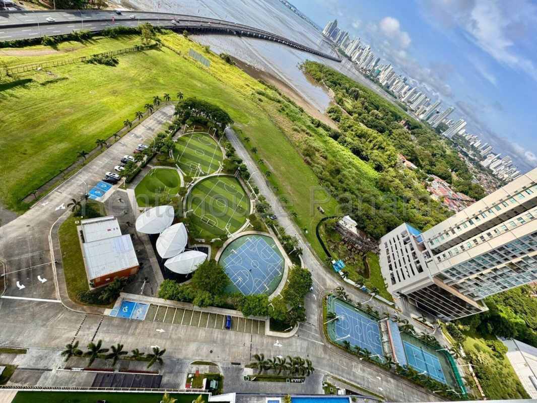 Aerial view sports tennis soccer courts coastline PH Oceana Costa del Este Panama