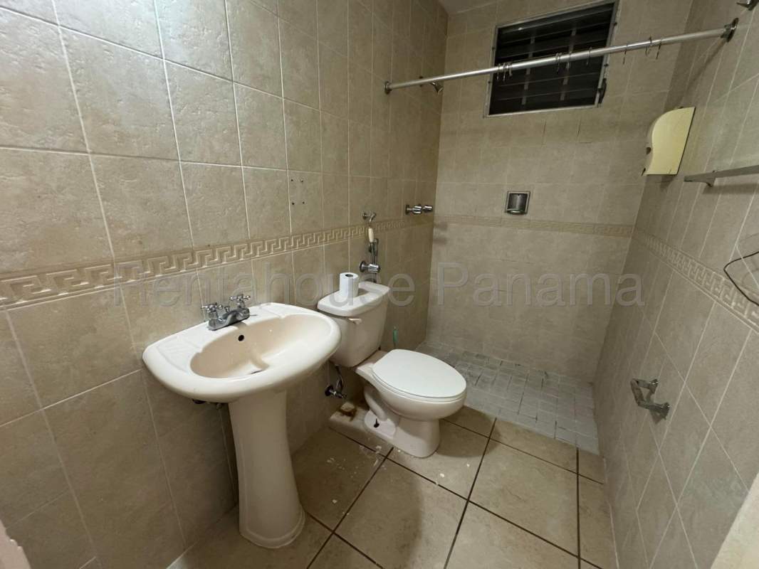 Bathroom with shower, pedestal sink in house for sale Panama City