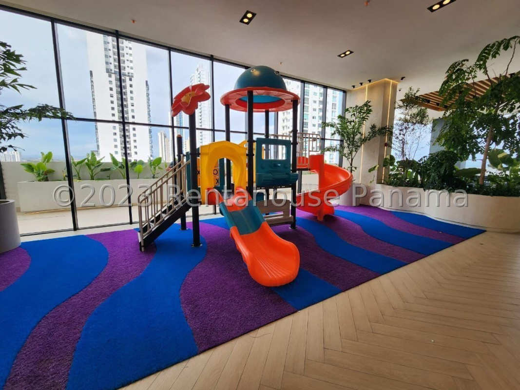 Colorful indoor children’s playground with climbing structures at PH Victory Wellness Coco del Mar Panama