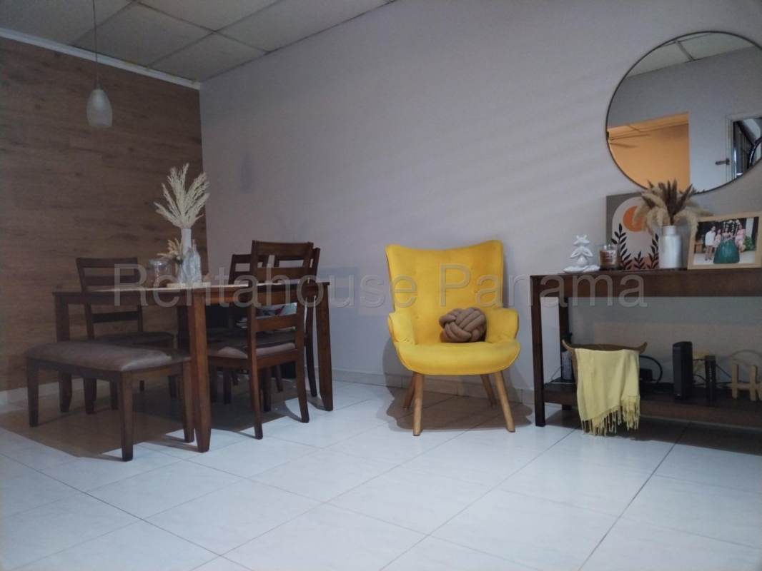 Traditional exterior facade with metal gate covered parking Don Bosco PH La Riviera