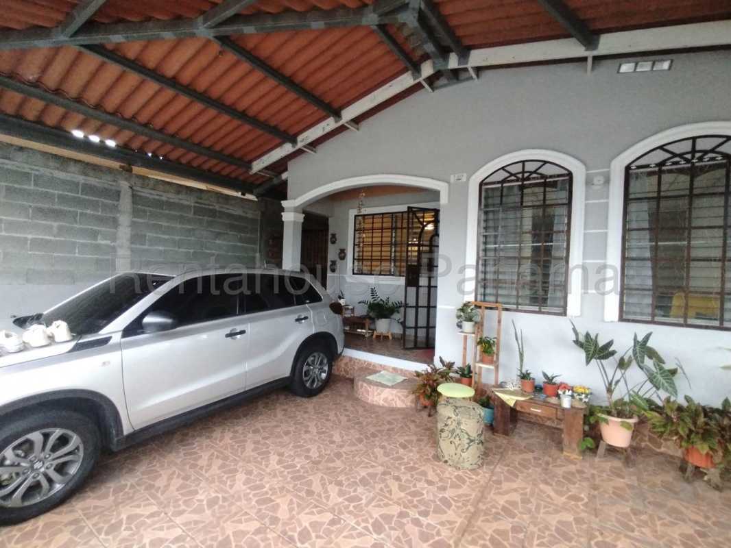 Combined open living and dining space with tiled floor at Don Bosco apartment