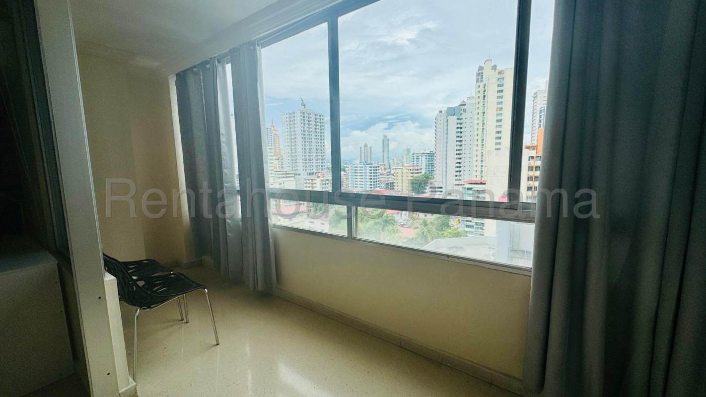 Large windows and balcony with city view in El Cangrejo Panama PH Bel Rey