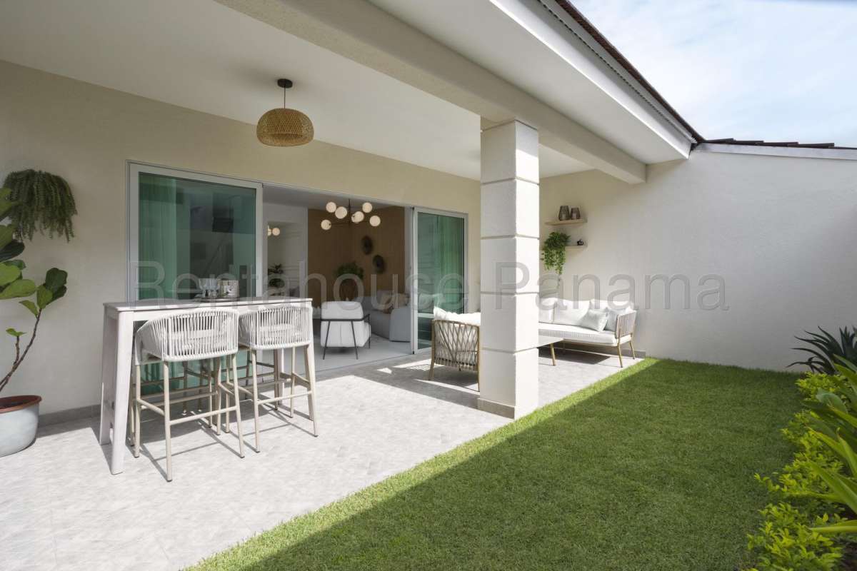 Swimming pool surrounded by lounging areas and social spaces in Altos del Parque Panama