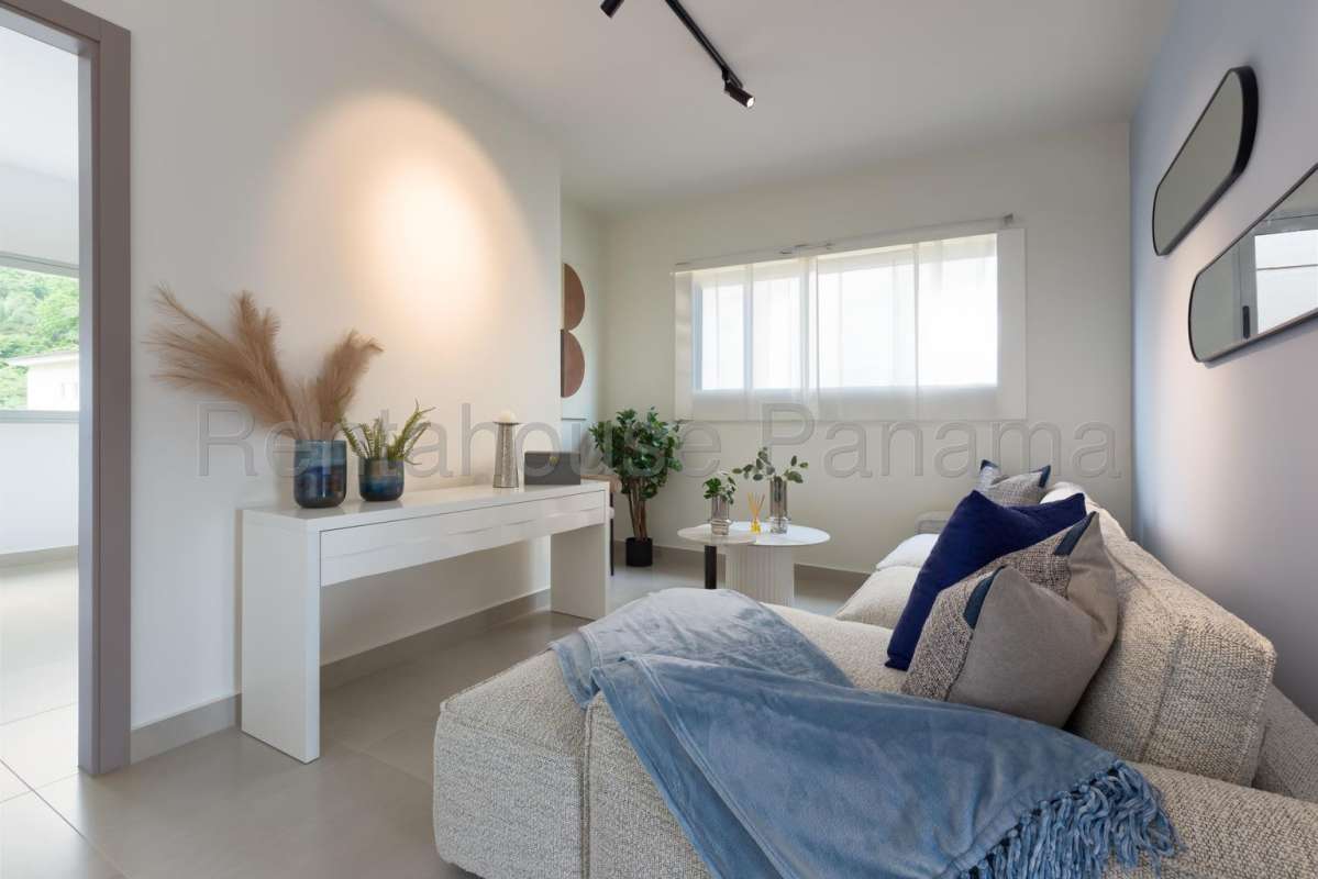 Open plan living and dining room with large windows and bright space in Altos del Parque Panama