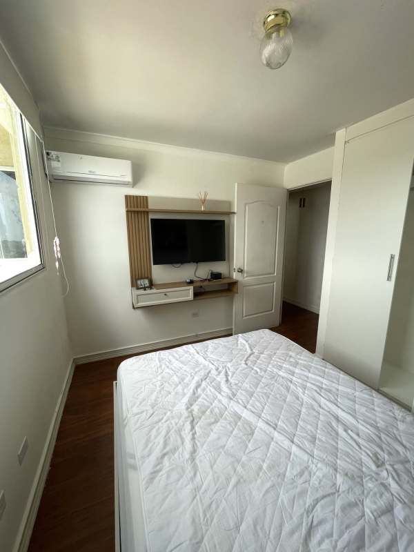 Bedroom featuring built-in closet and AC in PH Torres de España Tower 4 Panama City