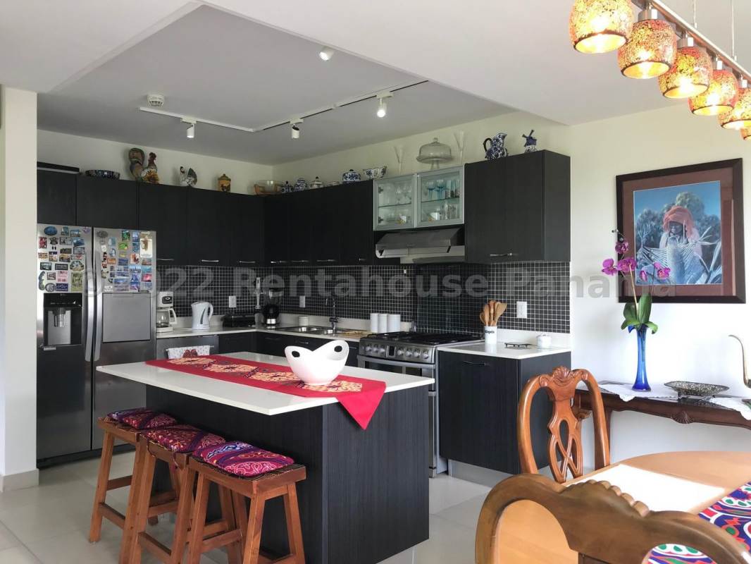 Elegant master bedroom with ocean and skyline views PH Ocean Club Panama