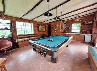 Rustic guest house with pool table and kitchenette at El Valle Mountain Estate Panama