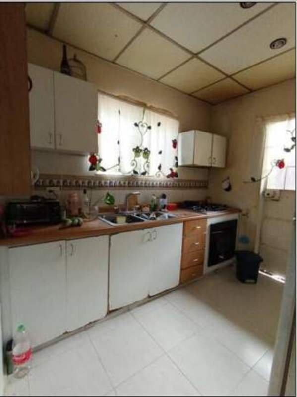 Bedroom with ceramic floors built-in closet in Don Bosco Panama house