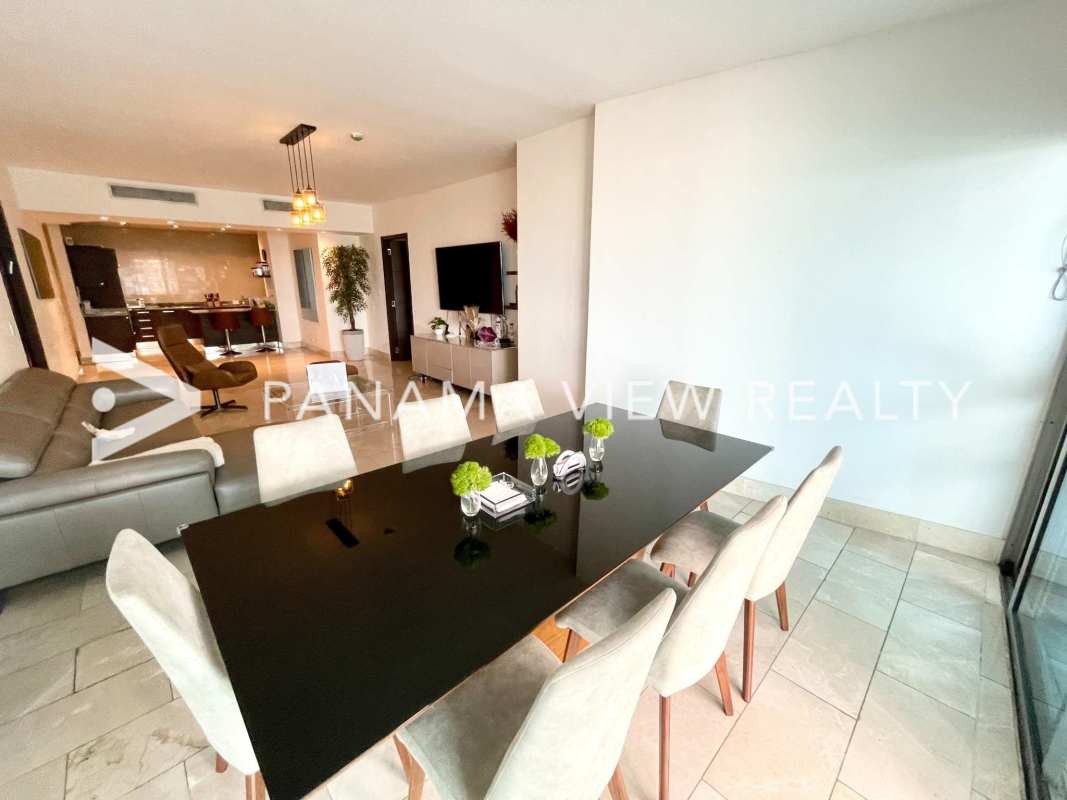 Large master bedroom with terrace access, ocean views and walk-in closet at PH Grand Tower Panama