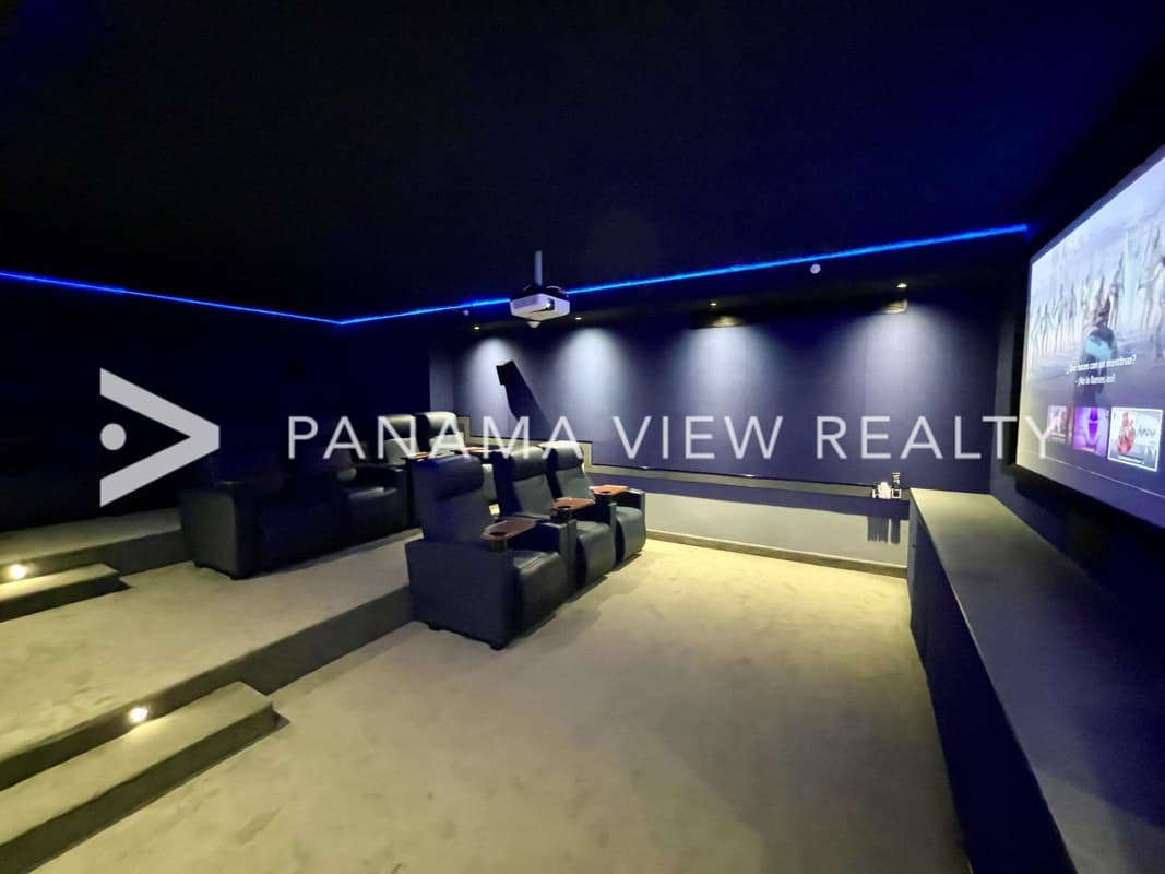 Living room with marble flooring and ocean-facing panoramic windows PH Costanera Panama