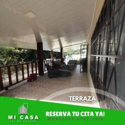 Large covered terrace with granite outdoor kitchen in Mediterranean house in Penonomé Panama