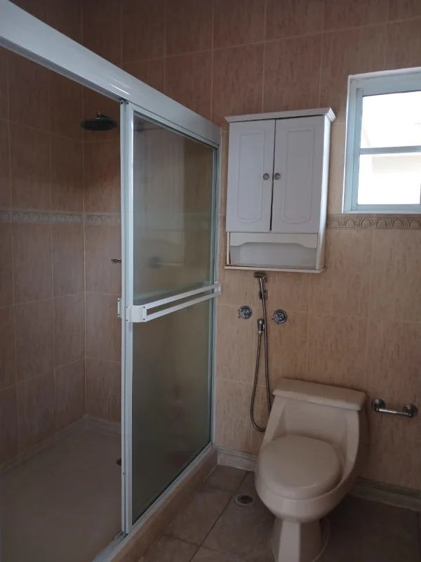 Spacious tiled living dining area with chandelier Costa del Este Panama