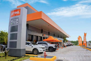 Commercial space with visible signage and orange awnings at Plaza Valencia in Coronado Panama