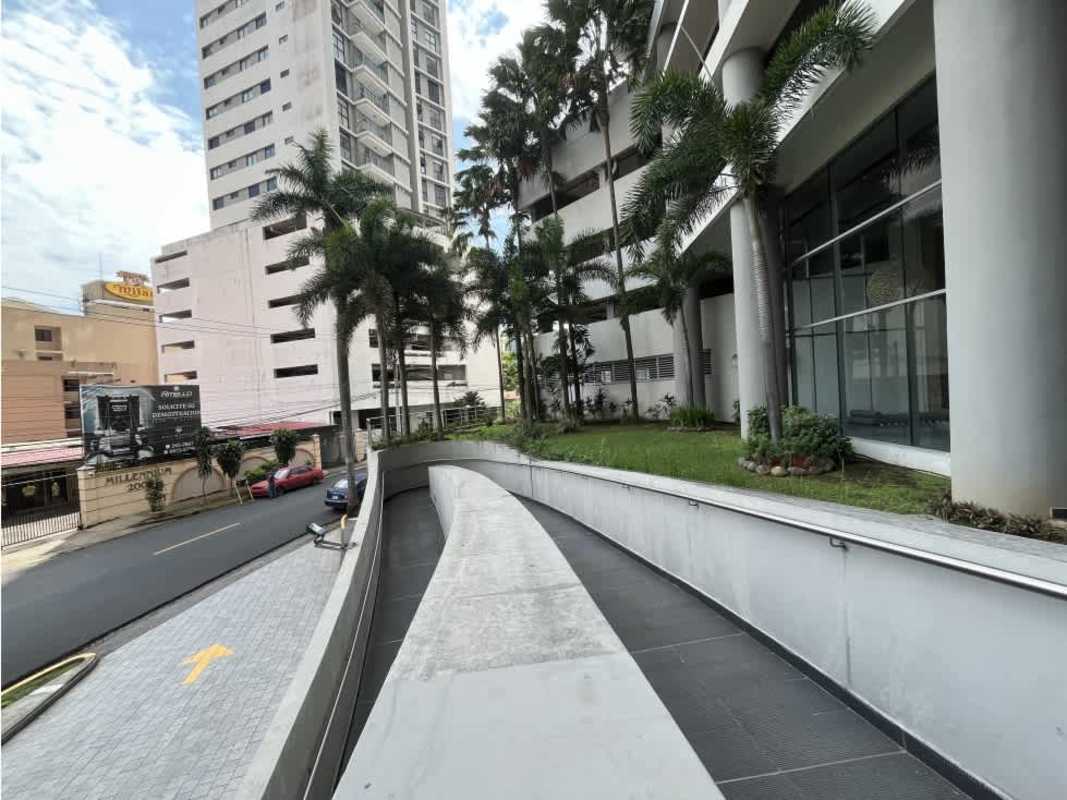 Kids playground with swings and slides on terrace at PH Luxor 100 El Cangrejo Panama City