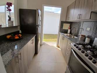 Open living dining area with ceramic floors in gated community Panama