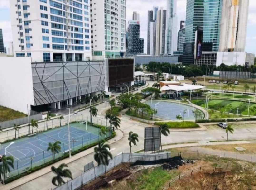 Bright living room with large windows, balcony access in PH Bali Costa del Este Panama