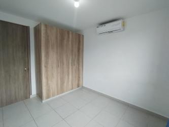 Modern bedroom with air conditioning and tile floors at PH Villas de La Campiña Panama